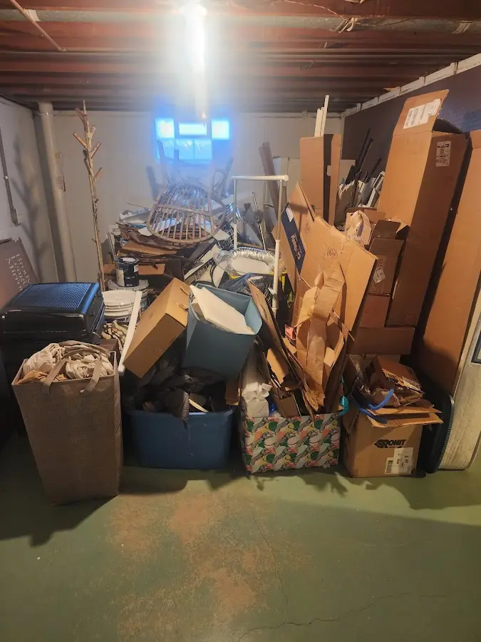 Roll-off dumpster container at job site for Construction Dumpster Rental in Terre du Lac